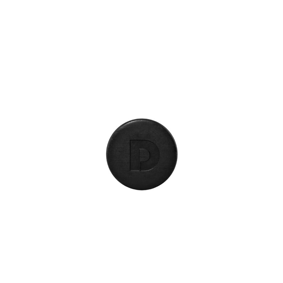 Shampooing solide noir EXO-GROW Colour Recharge de Dp Dermaceuticals, soin anti-âge pour cheveux et barbe.